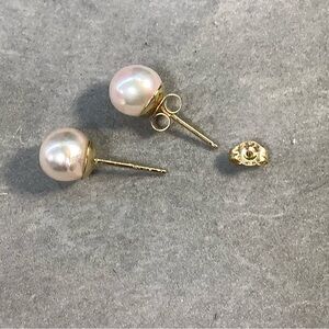 14K gold Elegant Pearl Stud Earrings and the earring backs are also 14K